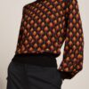 Jersey King Louie retro Erin Bell Waterloo 09270 001 MF e1728081895828