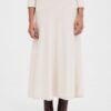 falda safa midi punto mus bombon beige e1760552656240