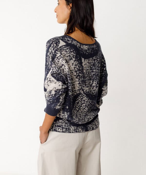 SKFK Sueter Naike chispeado scaled e1774251556165